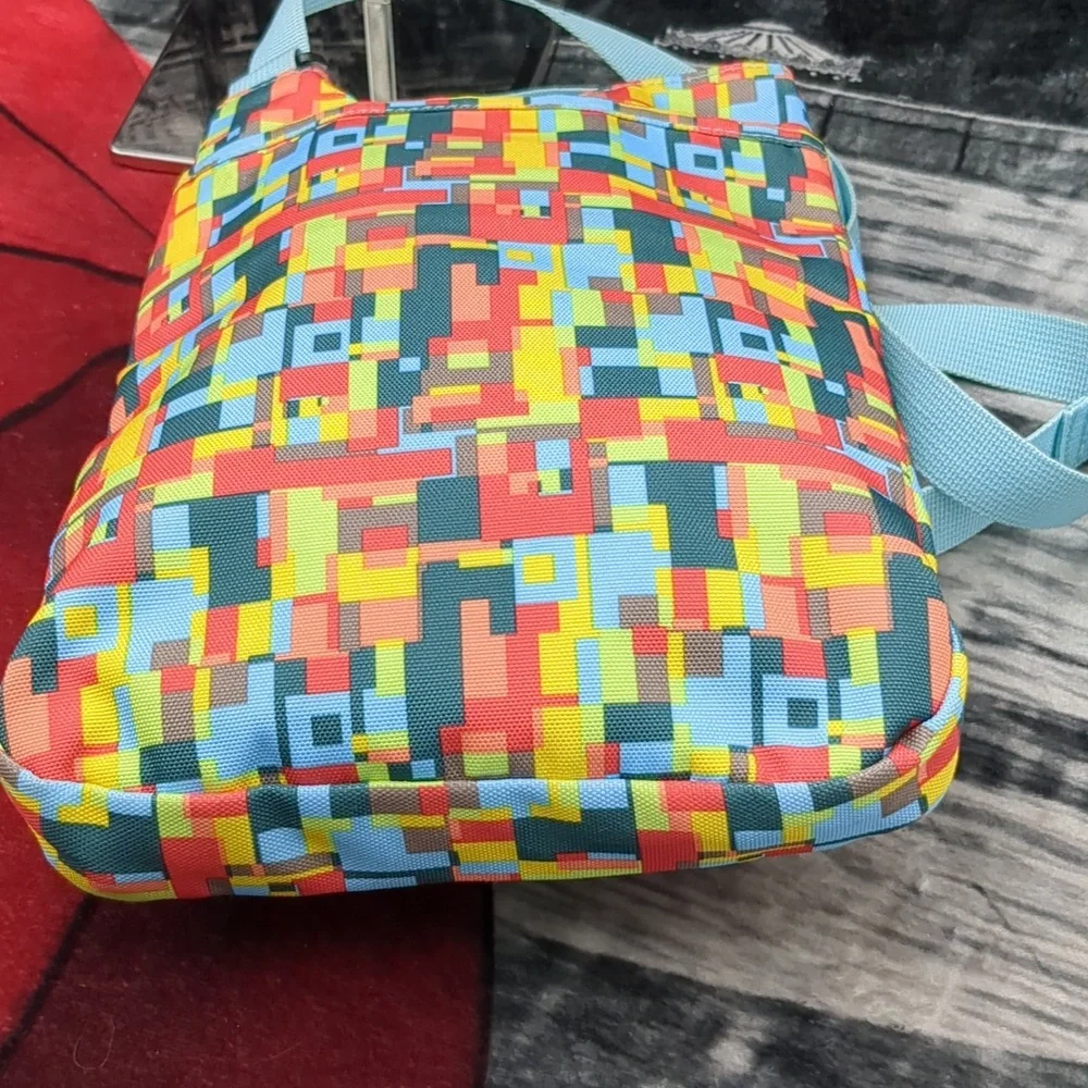 Kavu Keeper Crossbody Bag Geometric Teal Yellow Red